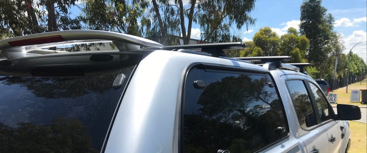 back view of rhino roof rack on ute roof and canopy roof