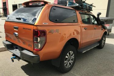 Rear view of orange Ford Ranger canopy