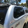back view of rhino roof rack on ute roof and canopy roof