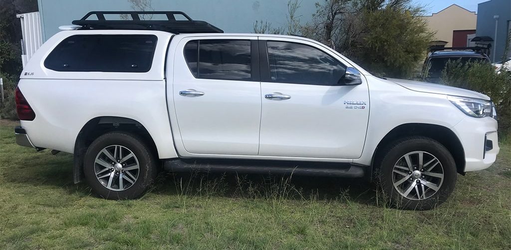side view of rhino roof rack on ute roof and canopy roof