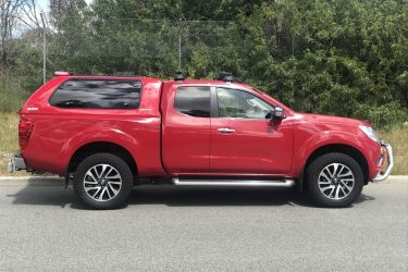 Side view of dual cab Nissan with canopy installed