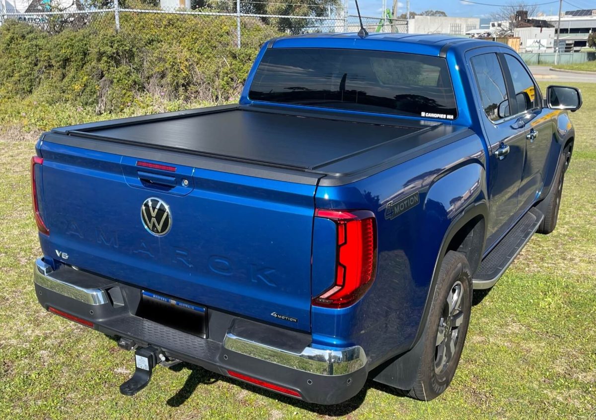 back view of roller lid installed on blue Volkswagen Amarok